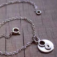 Lina, tobillera y pulsera espiral y círculo del infinito en plata
