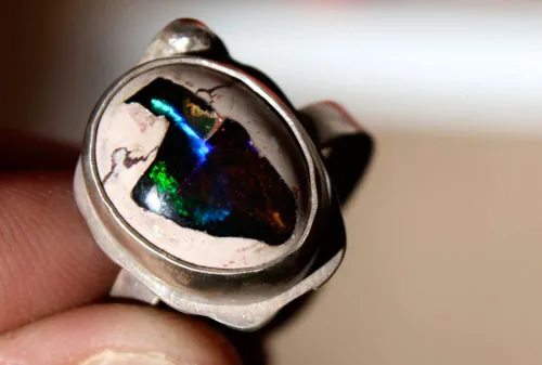 Mil fuegos, anillo espectáculo pirotécnico en plata y ópalo de fuego