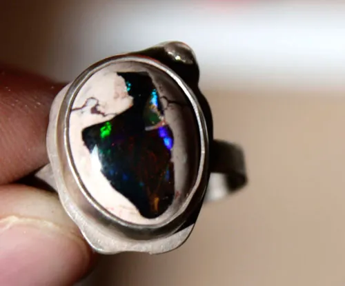 Mil fuegos, anillo espectáculo pirotécnico en plata y ópalo de fuego