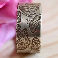 Ninfa, anillo mariposas en plata