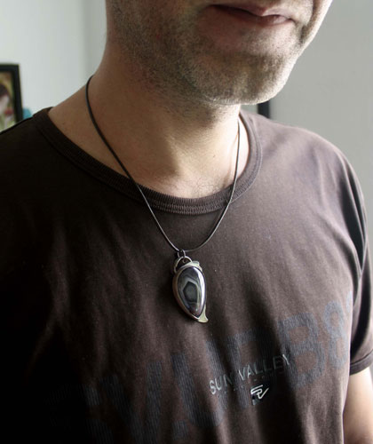 Ojo de águila, dije cabeza de ave rapaz en plata y ágata Botsuana