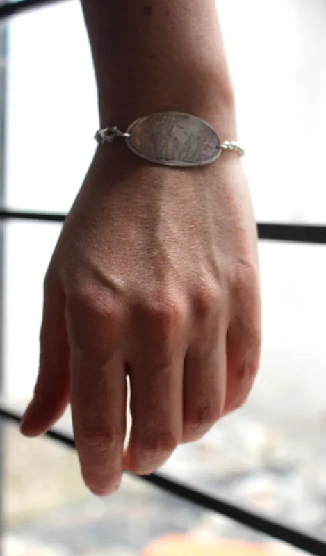 Raices, pulsera mapa del mundo en plata