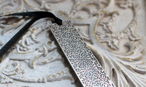 Sinfonía, separador de libros barroco en plata 925