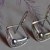 Sitara, aretes estrella y media luna en plata