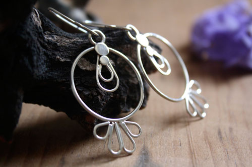 Sol tolteca, aretes prehispánicos en plata