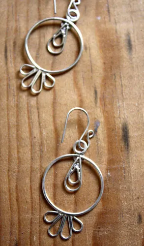 Sol tolteca, aretes prehispánicos en plata