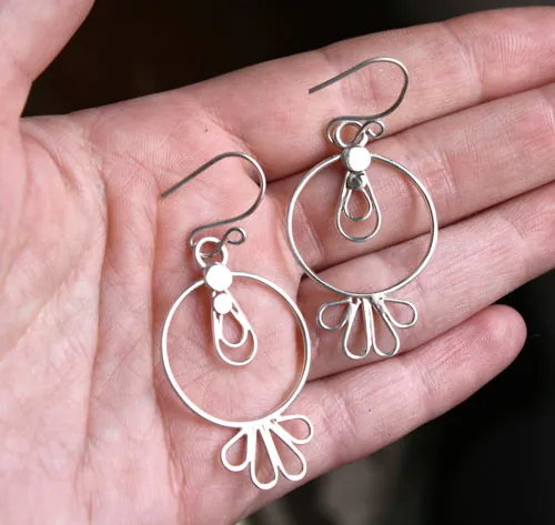 Sol tolteca, aretes prehispánicos en plata