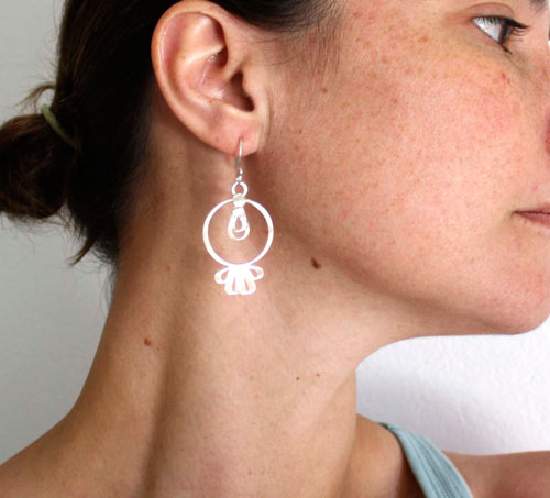 Sol tolteca, aretes prehispánicos en plata