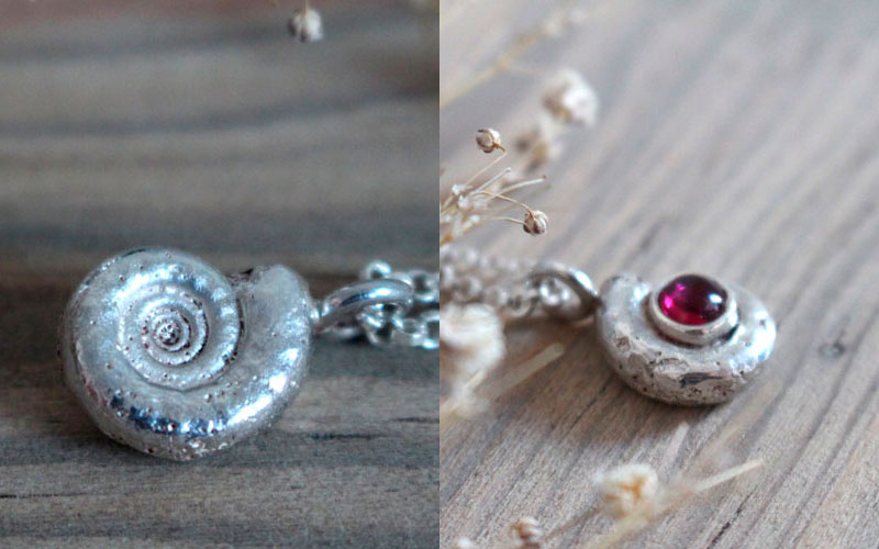 The cradle of life, nautilus ammonite and birthstone necklace in silver and ruby