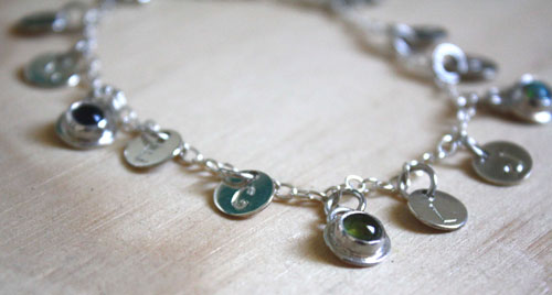The tree of Jesse, family keepsake bracelet in silver, amethyst, opal, and peridot