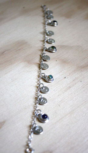 The tree of Jesse, family keepsake bracelet in silver, amethyst, opal, and peridot