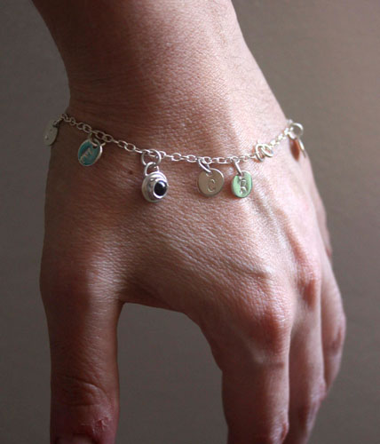The tree of Jesse, family keepsake bracelet in silver, amethyst, opal, and peridot