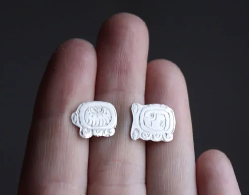 Tzolkin Tzolkin, aretes tipo broquel del calendario maya en plata